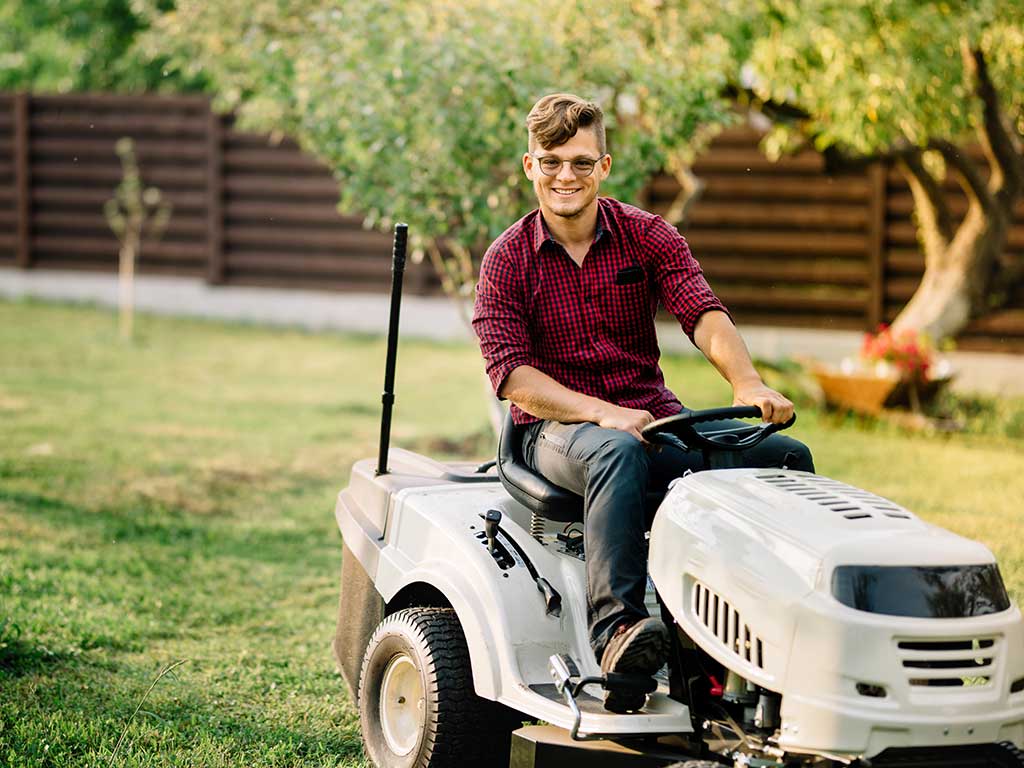 Lawn care professional using EasyQuoteBot